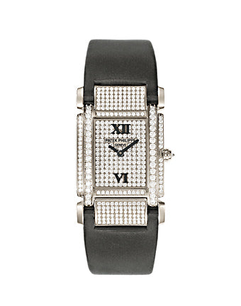 Patek Philippe Twenty~4 18K White Gold & Baguette Diamond Lady’s Watch